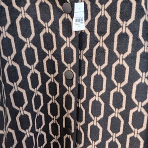 Ann Taylor coat Brand new;still has the tag on the coat. Size is a regular XL